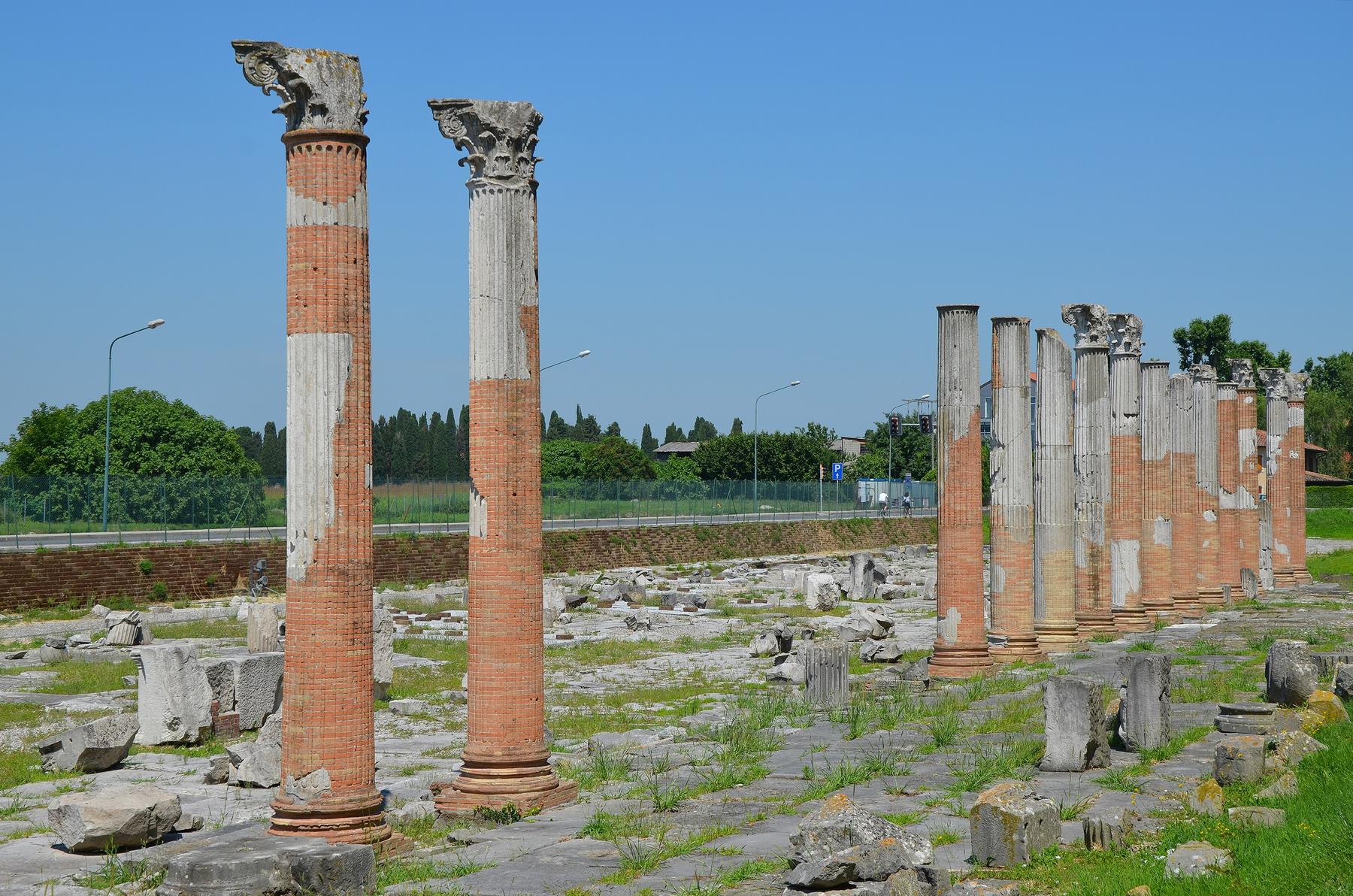 Restored Roman columns with Corinthian capitals at the Aquileia forum